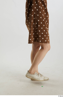 Aera  1 brown dots dress casual dressed flexing leg…